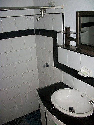 Ba&ntilde;o privado del apartamento