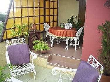 Comedor cubierto en la terraza